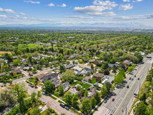 Aerial view of a major roadway and a mountain backdrop