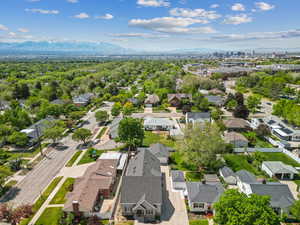 Aerial perspective of suburban area with a mountainous background