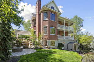 View of building exterior with a fire pit