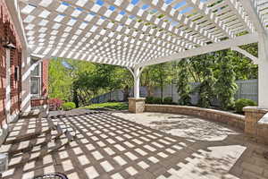 View of patio / terrace with a fenced backyard and a pergola