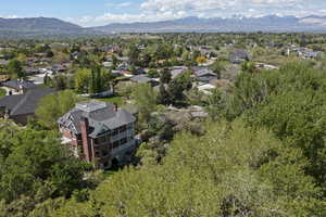 Aerial view of residential area featuring a mountainous background
