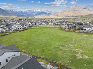 Aerial view of residential area with a mountainous background