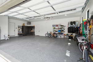 Garage featuring a garage door opener