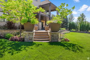 Exterior space featuring a balcony and covered porch