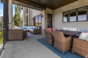 View of patio with an outdoor living space