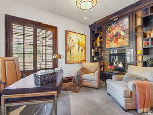Library in main floor primary bed/bath suite