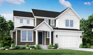 View of front facade with board and batten siding, an attached garage, and driveway