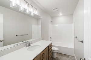 Bathroom with bathtub / shower combination and vanity