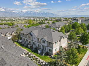 Aerial view of townhome area with mountains