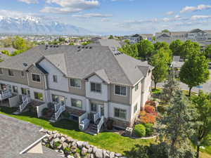 Aerial perspective of townhome area with a mountainous background