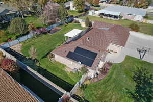 Aerial overview of property's location featuring nearby suburban area