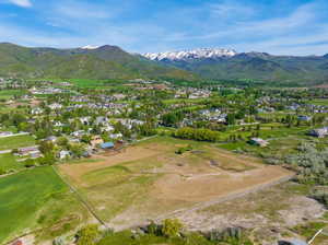 Aerial view of residential area featuring mountains