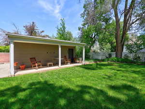 Rear view of house with a patio
