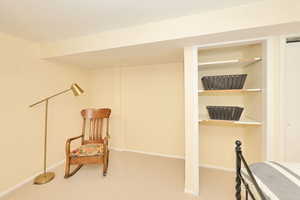 Unfurnished room with carpet flooring and baseboards