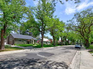 View of asphalt road with sidewalks