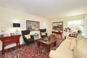 Living area featuring baseboards