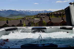 Mountain view featuring nearby suburban area