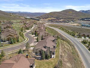 Drone / aerial view featuring a residential view and a mountain view
