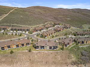 Drone / aerial view featuring a residential view and a mountain view