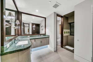 Bathroom featuring light tile patterned floors and recessed lighting