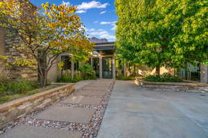 Obstructed view of property featuring stucco siding