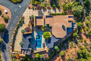 View of subject property with a pool area