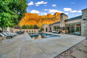 View of pool featuring a patio and an outdoor living space