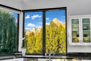 Doorway to outside featuring a sink