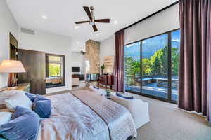 Carpeted bedroom with access to exterior and recessed lighting