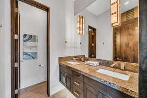 Bathroom with a sink and light wood-style floors
