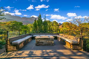 Wooden terrace with a mountain view and a forest view