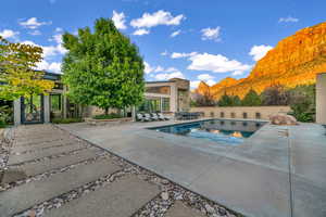 Outdoor pool with a patio area