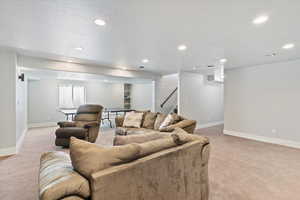 Versatile family room and rec room combination, providing ample space for both relaxation and entertainment.