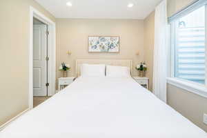 Bedroom with recessed lighting