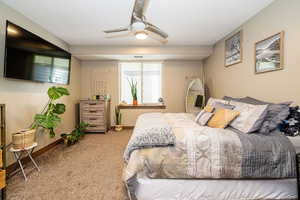 ADU Bedroom 2 with carpet flooring, baseboards, and ceiling fan