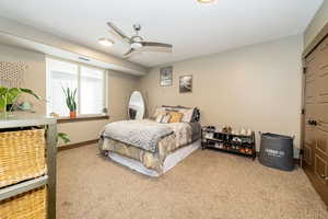 ADU Bedroom 2 featuring carpet floors, baseboards, and ceiling fan