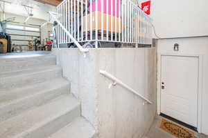 Garage entrance to ADU.  View of stairway