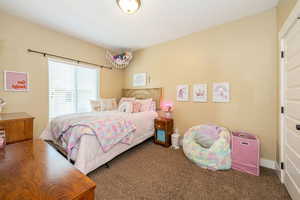 Bedroom with carpet
