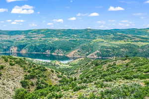 Mountain view featuring a large body of water