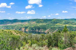 View of mountain background featuring a large body of water
