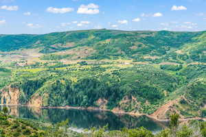 Mountain view featuring a large body of water