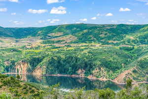 View of mountain background with a nearby body of water