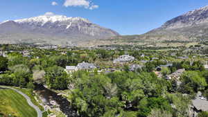 View of mountain backdrop with nearby suburban area