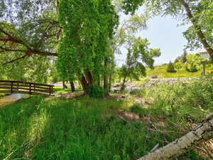 View of yard with fence