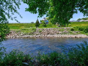 Water view with fence