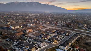 View of property location featuring a mountain backdrop and nearby suburban area