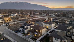 Aerial view at dusk of a mountain view and a residential view