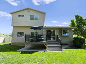 Rear view of house with Trex deck
