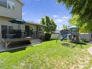 View of backyard and Trex deck