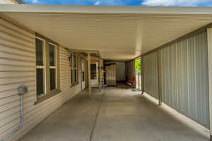 View of patio with an attached carport